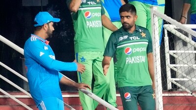 Pakistan's captain Babar Azam, right, shakes hands with Indian captain Rohit Sharma after the Asia Cup match (AP) Pakistan's captain Babar Azam, right, shakes hands with Indian captain Rohit Sharma after the Asia Cup match (AP)