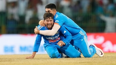 Kuldeep Yadav is embraced by Shubman Gill as they celebrate the wicket of Iftikhar Ahmed during the Asia Cup match between India and Pakistan (AP) Kuldeep Yadav is embraced by Shubman Gill as they celebrate the wicket of Iftikhar Ahmed during the Asia Cup match between India and Pakistan (AP)
