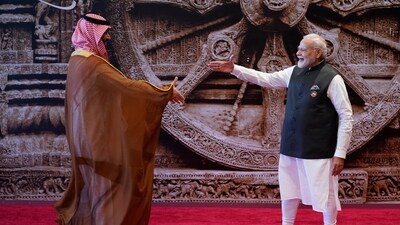 Indian Prime Minister Narendra Modi, right, welcomes Crown Prince Mohammed bin Salman of Saudi Arabia upon his arrival at Bharat Mandapam convention centre for the G20 Summit in New Delhi. (AP) Indian Prime Minister Narendra Modi, right, welcomes Crown Prince Mohammed bin Salman of Saudi Arabia upon his arrival at Bharat Mandapam convention centre for the G20 Summit in New Delhi. (AP)