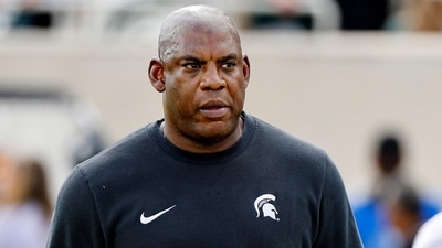 EAST LANSING, MICHIGAN - SEPTEMBER 09: Mel Tucker head coach of the Michigan State Spartans looks on before a game against the Richmond Spiders at Spartan Stadium on September 09, 2023 in East Lansing, Michigan. Mike Mulholland/Getty Images/AFP (Photo by Mike Mulholland / GETTY IMAGES NORTH AMERICA / Getty Images via AFP) (Getty Images via AFP) EAST LANSING, MICHIGAN - SEPTEMBER 09: Mel Tucker head coach of the Michigan State Spartans looks on before a game against the Richmond Spiders at Spartan Stadium on September 09, 2023 in East Lansing, Michigan. Mike Mulholland/Getty Images/AFP (Photo by Mike Mulholland / GETTY IMAGES NORTH AMERICA / Getty Images via AFP) (Getty Images via AFP)
