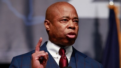(FILES) New York Mayor Eric Adams speaks during the New York Democratic Party 2022 state Nominating Convention, in New York on February 17, 2022. Adams, the Democratic mayor of New York, sounded the alarm this week over the financial strain his city faces as thousands of asylum seekers arrive each month -- many sent by Republican governors after crossing the southern US border. "This issue will destroy New York City," Adams said September 6, 2023, evening at a public meeting where he responded to residents' questions. (Photo by KENA BETANCUR / AFP) (AFP) (FILES) New York Mayor Eric Adams speaks during the New York Democratic Party 2022 state Nominating Convention, in New York on February 17, 2022. Adams, the Democratic mayor of New York, sounded the alarm this week over the financial strain his city faces as thousands of asylum seekers arrive each month -- many sent by Republican governors after crossing the southern US border. "This issue will destroy New York City," Adams said September 6, 2023, evening at a public meeting where he responded to residents' questions. (Photo by KENA BETANCUR / AFP) (AFP)