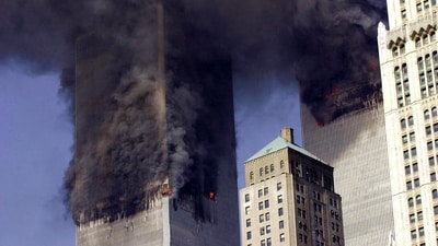(FILES) (FILES) In this file photo smoke billows from the twin towers of the World Trade Center in lower Manhattan, New York on September 11, 2001. A proposal to allow alleged perpetrators of the 9/11 attacks to plead guilty and avoid the death penalty poses a powerful dilemma for victims' families, some of whom still want to seek the ultimate retribution after two decades of legal limbo. The proposal detailed by prosecutors in a letter this month could offer families of the nearly 3,000 victims the best path to a resolution of a case bogged down in pre-trial maneuverings in the Guantanamo military commissions for years -- and with no end in sight. (Photo by STAN HONDA / AFP) (AFP) (FILES) (FILES) In this file photo smoke billows from the twin towers of the World Trade Center in lower Manhattan, New York on September 11, 2001. A proposal to allow alleged perpetrators of the 9/11 attacks to plead guilty and avoid the death penalty poses a powerful dilemma for victims' families, some of whom still want to seek the ultimate retribution after two decades of legal limbo. The proposal detailed by prosecutors in a letter this month could offer families of the nearly 3,000 victims the best path to a resolution of a case bogged down in pre-trial maneuverings in the Guantanamo military commissions for years -- and with no end in sight. (Photo by STAN HONDA / AFP) (AFP)