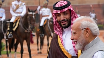 Crown Prince Mohammed bin Salman of Saudi Arabia speaks to Prime Minister Narendra Modi upon his arrival for a ceremonial reception at the presidential palace in New Delhi on Monday, (AP)