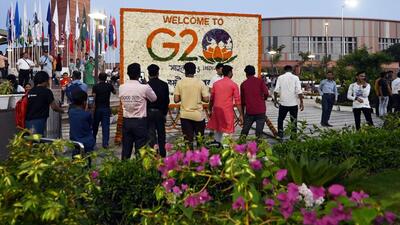 People near Bharat Mandapam at Pragati Maidan after the G20 Summit in Delhi on Monday. (Sanjeev Verma/ HT Photo) People near Bharat Mandapam at Pragati Maidan after the G20 Summit in Delhi on Monday. (Sanjeev Verma/ HT Photo)