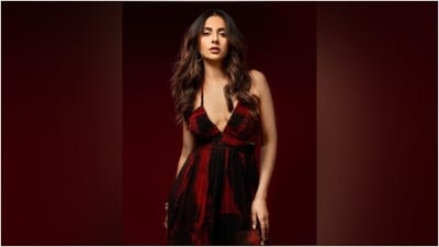 Rakul accessorised the halter-neck ensemble with calf-length black boots featuring high heels, gold bracelets, and statement rings. Lastly, she chose centre-parted open wavy locks, darkened brows, subtle shimmery eye shadow, mascara on the lashes, glossy mauve lip shade, blushed cheeks, and beaming highlighter for the glam picks. (Instagram) Rakul accessorised the halter-neck ensemble with calf-length black boots featuring high heels, gold bracelets, and statement rings. Lastly, she chose centre-parted open wavy locks, darkened brows, subtle shimmery eye shadow, mascara on the lashes, glossy mauve lip shade, blushed cheeks, and beaming highlighter for the glam picks. (Instagram)