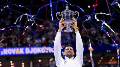 Novak Djokovic, of Serbia, holds up the championship trophy after defeating Daniil Medvedev, of Russia, in the men's singles final of the U.S. Open tennis championships, Sunday, Sept. 10, 2023 (AP) Novak Djokovic, of Serbia, holds up the championship trophy after defeating Daniil Medvedev, of Russia, in the men's singles final of the U.S. Open tennis championships, Sunday, Sept. 10, 2023 (AP)