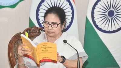 West Bengal chief minister Mamata Banerjee shows a copy of the Constitution of India during a press conference at Nabanno in Kolkata on Monday. (HT Photo) West Bengal chief minister Mamata Banerjee shows a copy of the Constitution of India during a press conference at Nabanno in Kolkata on Monday. (HT Photo)