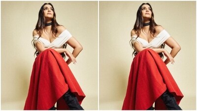 In a black neck choker and black long boots, Sonam further accessorised her look for the day. "Painting the town red," the actor captioned her pictures. (Instagram/@sonamkapoor) In a black neck choker and black long boots, Sonam further accessorised her look for the day. "Painting the town red," the actor captioned her pictures. (Instagram/@sonamkapoor)