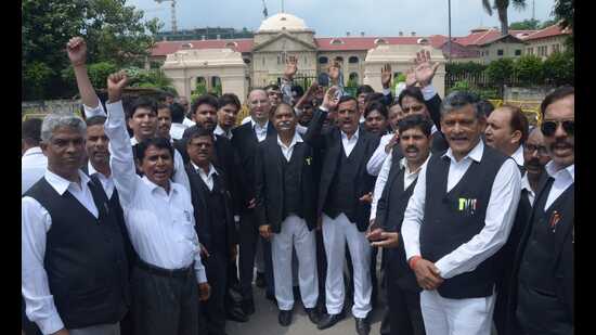 Lawyers protest outside the Allahabad high court in Prayagraj on Monday (HT)
