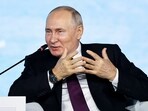 Russian President Vladimir Putin gestures while speaking at the Eastern Economic Forum in Vladivostok, Russia.