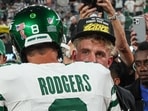Sep 11, 2023; East Rutherford, New Jersey, USA; New York Jets quarterback Aaron Rodgers (8) is greeted by social media personality Jake Paul before the game against the Buffalo Bills at MetLife Stadium. Mandatory Credit: Vincent Carchietta-USA TODAY Sports