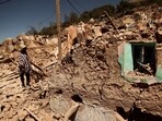 Mohamed Ouchen, 66, a survivor, who helped to pull his sister and her husband with their children from rubble, looks at his destroyed house, in the aftermath of a deadly earthquake, in Morocco