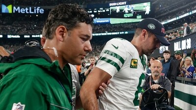 New York Jets quarterback Aaron Rodgers (8) is helped off the field during the first quarter of an NFL football game against the Buffalo Bills, Monday, Sept. 11, 2023, in East Rutherford, N.J. (AP Photo/Adam Hunger) (AP) New York Jets quarterback Aaron Rodgers (8) is helped off the field during the first quarter of an NFL football game against the Buffalo Bills, Monday, Sept. 11, 2023, in East Rutherford, N.J. (AP Photo/Adam Hunger) (AP)
