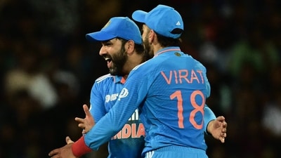 India's captain Rohit Sharma (L) and Virat Kohli celebrate after the dismissal of Sri Lanka's Charith Asalanka (AFP) India's captain Rohit Sharma (L) and Virat Kohli celebrate after the dismissal of Sri Lanka's Charith Asalanka (AFP)