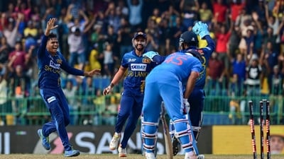 Sri Lanka's Dunith Wellalage (L) celebrates with teammates after taking the wicket of India's captain Rohit Sharma (AFP) Sri Lanka's Dunith Wellalage (L) celebrates with teammates after taking the wicket of India's captain Rohit Sharma (AFP)