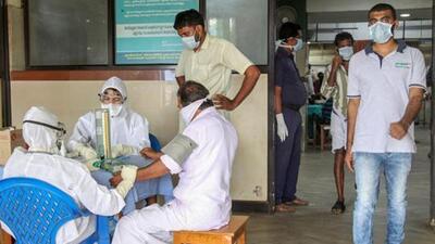 Doctors and patients wear masks as a precautionary measure after the 'Nipah' virus outbreak in Kozhikode, Kerala in 2018. (PTI File Photo) Doctors and patients wear masks as a precautionary measure after the 'Nipah' virus outbreak in Kozhikode, Kerala in 2018. (PTI File Photo)