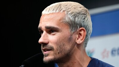 French player Antoine Griezmann talks to the media at a press conference (AP) French player Antoine Griezmann talks to the media at a press conference (AP)