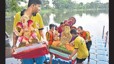 In response, the BMC is preparing alternative arrangements for Ganpati immersions. Rajesh Akre, the assistant commissioner of the P South Ward, said, “There will be three floating talaos in Aarey for all domestic idols of height below 4 feet, one at the West gate, another at the Picnic spot and one will be mobile on the road in Dinkar Rao Desai Marg. There are also 14 artificial ponds in the ward.” (HT PHOTO) In response, the BMC is preparing alternative arrangements for Ganpati immersions. Rajesh Akre, the assistant commissioner of the P South Ward, said, “There will be three floating talaos in Aarey for all domestic idols of height below 4 feet, one at the West gate, another at the Picnic spot and one will be mobile on the road in Dinkar Rao Desai Marg. There are also 14 artificial ponds in the ward.” (HT PHOTO)