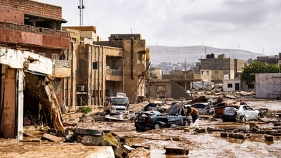 A view of destroyed vehicles and damaged buildings in the eastern city of Derna, about 290 kilometres east of Benghazi, (AFP) A view of destroyed vehicles and damaged buildings in the eastern city of Derna, about 290 kilometres east of Benghazi, (AFP)