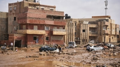 Multistory apartment buildings that once stood well back from the river were partially collapsed into the mud. (AP) Multistory apartment buildings that once stood well back from the river were partially collapsed into the mud. (AP)