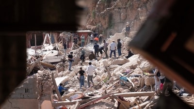Morocco Earthquake: People dig through the rubble as they search for people who were killed by the earthquake, in the town of Imi N'tala, outside Marrakech, Morocco. (AP)
