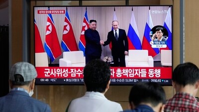 A TV screen shows a file image of North Korean leader Kim Jong Un, left, and Russian President Vladimir Putin during a news program at the Seoul Railway Station in Seoul, South Korea, Tuesday, Sept. 12, 2023. (AP) A TV screen shows a file image of North Korean leader Kim Jong Un, left, and Russian President Vladimir Putin during a news program at the Seoul Railway Station in Seoul, South Korea, Tuesday, Sept. 12, 2023. (AP)