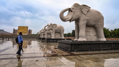 A lightning strike damaged a 10 feet tall marble elephant statue positioned near the entrance of Ambedkar Park in Lucknow on Monday. The incident occurred at around 3:30 am, during a thunderstorm. (PTI) A lightning strike damaged a 10 feet tall marble elephant statue positioned near the entrance of Ambedkar Park in Lucknow on Monday. The incident occurred at around 3:30 am, during a thunderstorm. (PTI)