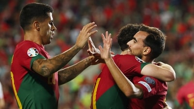 Portugal's Ricardo Horta celebrates scoring their sixth goal with Diogo Jota and Joao Cancelo (REUTERS)