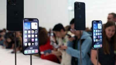 The premium iPhone 15 Pro and iPhone 15 Pro Max models will come equipped with an "action button" instead of the traditional mute switch, allowing users to customize it for a wide range of functions. (Getty Images via AFP) The premium iPhone 15 Pro and iPhone 15 Pro Max models will come equipped with an "action button" instead of the traditional mute switch, allowing users to customize it for a wide range of functions. (Getty Images via AFP)