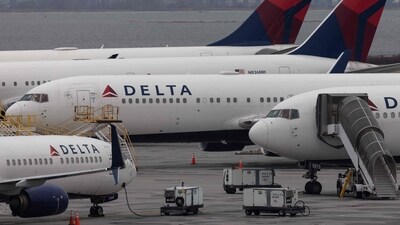 Passengers who were travelling on a Delta flight to New York were diverted and taken to a Portuguese island instead, where they were allegedly stuck for as many as 12 hours (Photo by Yuki IWAMURA / AFP - representational) (AFP) Passengers who were travelling on a Delta flight to New York were diverted and taken to a Portuguese island instead, where they were allegedly stuck for as many as 12 hours (Photo by Yuki IWAMURA / AFP - representational) (AFP)