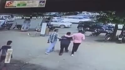 Mohit Yadav alias Monu Manesar purportedly being picked up away by policemen in plain clothes.