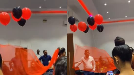 The image shows balloon attached to a bride's outfit. (Screengrab)