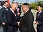 Russian President Vladimir Putin, left, and North Korea's leader Kim Jong Un shake hands during their meeting at the Vostochny cosmodrome outside the city of Tsiolkovsky.