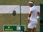 Spain's Rafael Nadal reacts as the scoreboard shows the result of a hawk-eye challenge 