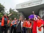 Members of Maratha Kranti Morcha staged a protest at the district collectorate over the police lathi charge on those seeking reservation at Jalna. (KALPESH NUKTE/HT)