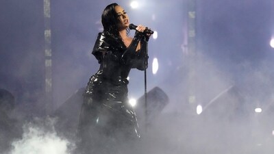Demi Lovato performs during the MTV Video Music Awards. She wore a latex black form-fitting gown for the occasion. (Charles Sykes/Invision/AP) Demi Lovato performs during the MTV Video Music Awards. She wore a latex black form-fitting gown for the occasion. (Charles Sykes/Invision/AP)