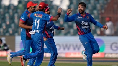 Rashid Khan celebrates with teammates after taking a wicket (AP) Rashid Khan celebrates with teammates after taking a wicket (AP)
