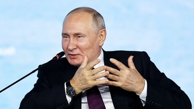 Russian President Vladimir Putin gestures while speaking at the Eastern Economic Forum in Vladivostok, Russia, (AP)
