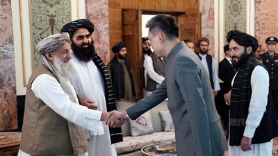 China's new ambassador to Afghanistan Zhao Sheng shakes hand with Taliban Prime Minister Mohammad Hasan Akhund. (AP) China's new ambassador to Afghanistan Zhao Sheng shakes hand with Taliban Prime Minister Mohammad Hasan Akhund. (AP)