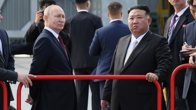Russian president Vladimir Putin and North Korea's leader Kim Jong Un examine a launch pad during their meeting at the Vostochny cosmodrome. (AP)