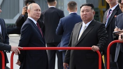 Russian president Vladimir Putin and North Korea's leader Kim Jong Un examine a launch pad during their meeting at the Vostochny cosmodrome. (AP)