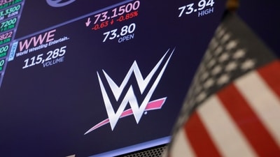 The logo for WWE appears above a trading post on the floor of the New York Stock Exchange (AP) The logo for WWE appears above a trading post on the floor of the New York Stock Exchange (AP)