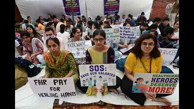 Junior resident doctors holding a protest at GMCH, Sector 32, Chandigarh, on Wednesday. (Ravi Kumar/HT)