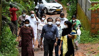 Members of a medical team from Kozhikode Medical College carry areca nut and guava fruit samples to conduct tests for Nipah virus in Maruthonkara village in Kozhikode district, Kerala, India, September 13, 2023 (REUTERS) Members of a medical team from Kozhikode Medical College carry areca nut and guava fruit samples to conduct tests for Nipah virus in Maruthonkara village in Kozhikode district, Kerala, India, September 13, 2023 (REUTERS)