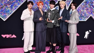 Tomorrow X Together's (aka TXT) Taehyun, Yeonjun, Soobin, HueningKai, and Beomgyu pose for the paparazzi on the MTV Video Music Awards' pink carpet. The K-pop boy band won the MTV VMA for the Push Performance of the Year for their song Sugar Rush Ride from their 2023 album Sweet. (AFP) Tomorrow X Together's (aka TXT) Taehyun, Yeonjun, Soobin, HueningKai, and Beomgyu pose for the paparazzi on the MTV Video Music Awards' pink carpet. The K-pop boy band won the MTV VMA for the Push Performance of the Year for their song Sugar Rush Ride from their 2023 album Sweet. (AFP)