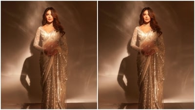Esha looked like a dream in the silver saree featuring sequined silver zari details throughout. She teamed her saree with a matching full-sleeve blouse with a plunging neckline. (Instagram/@egupta) Esha looked like a dream in the silver saree featuring sequined silver zari details throughout. She teamed her saree with a matching full-sleeve blouse with a plunging neckline. (Instagram/@egupta)