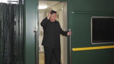 North Korean leader Kim Jong Un waves from a train in Pyongyang. (AP ) North Korean leader Kim Jong Un waves from a train in Pyongyang. (AP )