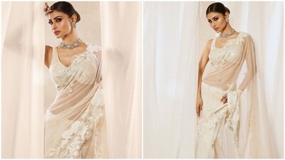 Mouni Roy believes in keeping it chic, stylish and comfortable. The actor is known for her fashion diaries and with each photoshoot, she raises the fashion bar higher for us. From casuals to ethnic to formals, Mouni's fashion diaries are inspo for her fans and for all the right reasons. The actor, on Wednesday, made our day brighter with a string of pictures looking stunning as ever in the six yards of grace. (Instagram/@imouniroy) Mouni Roy believes in keeping it chic, stylish and comfortable. The actor is known for her fashion diaries and with each photoshoot, she raises the fashion bar higher for us. From casuals to ethnic to formals, Mouni's fashion diaries are inspo for her fans and for all the right reasons. The actor, on Wednesday, made our day brighter with a string of pictures looking stunning as ever in the six yards of grace. (Instagram/@imouniroy)