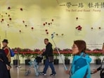 In this file photo, visitors walk past a wall with a map showing the Belt and Road Initiative (BRI) countries, at an exhibition in Beijing, China.. (REUTERS)