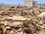 Search teams are combing streets, wrecked buildings, and even the sea to look for bodies in Derna, where the collapse of two dams unleashed a massive flash flood that killed thousands of people. (AP Photo)